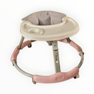 Baby walker with pink base and gray seat on a white background